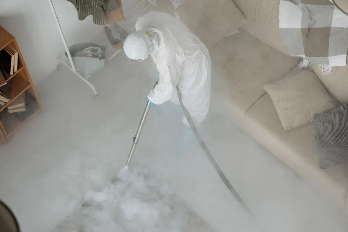 Biohazard cleanup technician in protective equipment, Navarre, FL